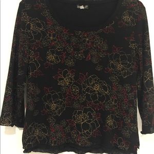 NWOT.  dress blouse lined .  Black flower pattern